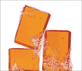 Stack of NEUTROGENA® bar soaps with bubbles